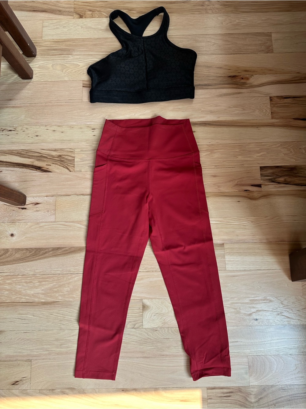 Women's High-Rise Red Performanc Capri Leggings and Black Sports Bra Bundle.